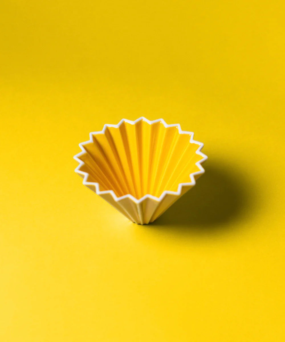 Yellow Origami ceramic pour over coffee dripper made from Japanese Mino porcelain for cone and flat bottom filter brewing