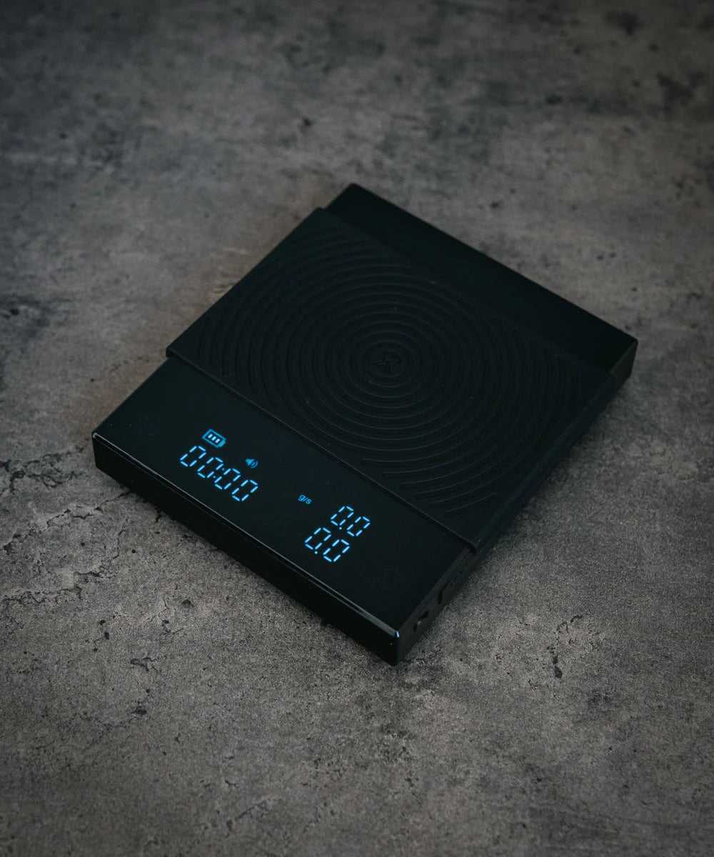Timemore Black Mirror Basic 2 digital coffee scale used for precise pour over, espresso, and drip coffee brewing at home